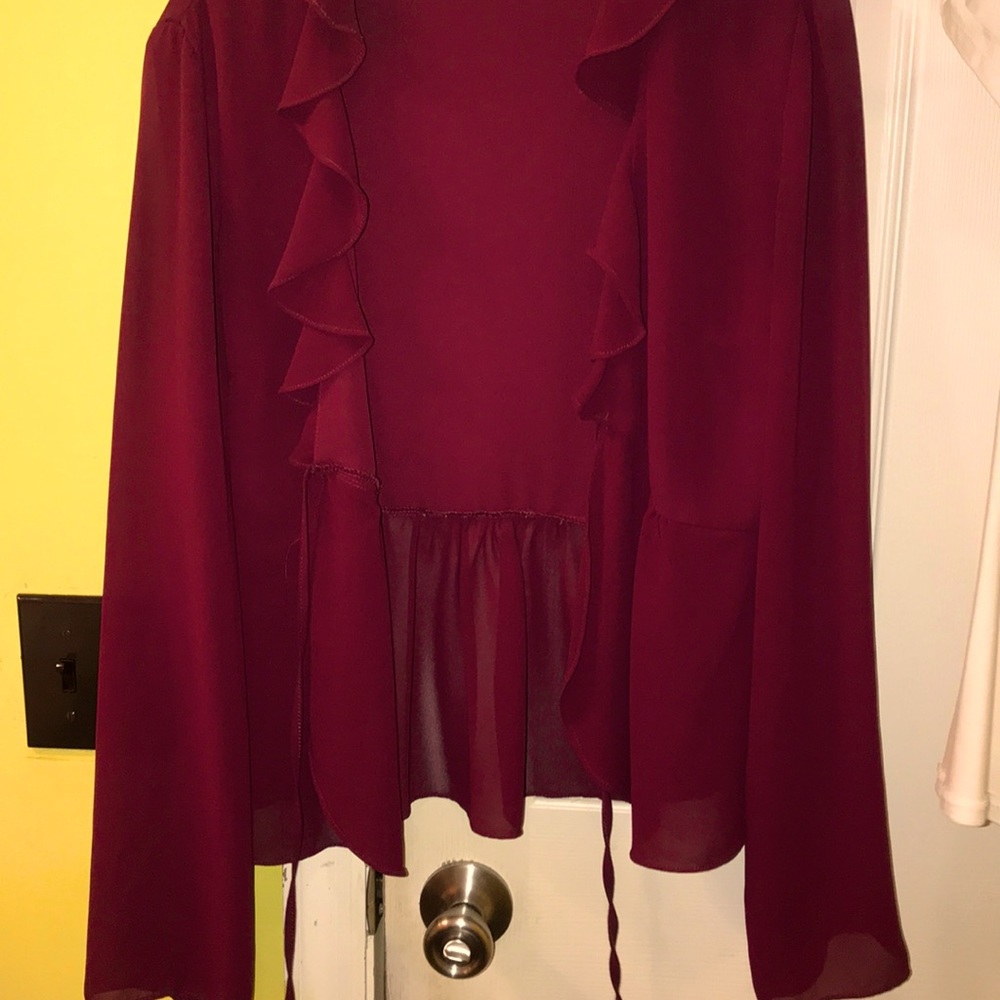 A burgundy blouse.